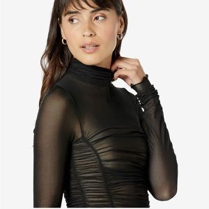 Free People Under It All Bodysuit. 
Size large, black